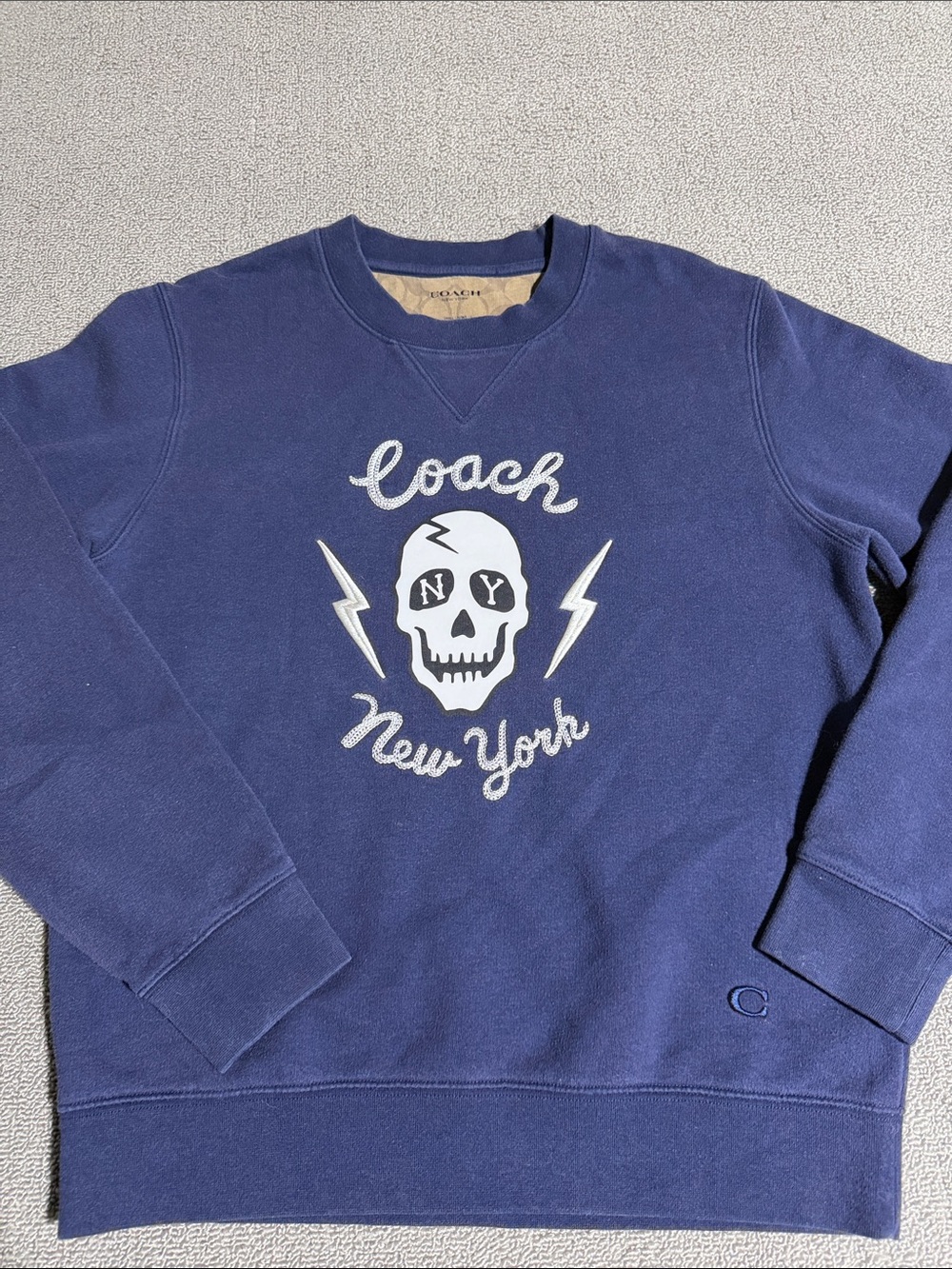 Coach Navy Crewneck Sweatshirt with White Skull Graphic